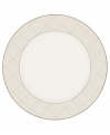 Dressed in a fine diamond grid of bronze and warm taupe, this round platter is tailored for formal dining and everyday elegance in bone china. It's a handsome host for roast chicken or vegetable kabobs. From Noritake's collection of serveware and serving dishes.