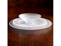 Designed by Göran Wärff, Limelight glass dinnerware truly stands out in a sea of stoneware, china and porcelain. From the legendary Swedish designers at Kosta Boda, these beautiful plates and bowls are smooth on top and textured underneath. Designed by Göran Wärff, Limelight glass dinnerware truly stands out in a sea of stoneware, china and porcelain. From the legendary Swedish designers at Kosta Boda, these beautiful plates and bowls are smooth on top and textured underneath.