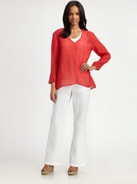 Chic and breezy, this linen top features a universally flattering neckline and a touch of texture.V-necklineThree-quarter sleevesCurved hemPull-on styleAbout 26 from shoulder to hemLinenDry cleanImported Model shown is 5'9 (175cm) wearing US size Small. Chic and breezy, this linen top features a universally flattering neckline and a touch of texture.V-necklineThree-quarter sleevesCurved hemPull-on styleAbout 26 from shoulder to hemLinenDry cleanImported Model shown is 5'9 (175cm) wearing US size Small.