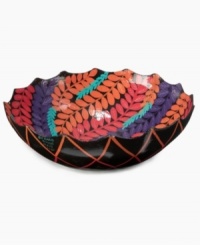 Designed and vibrantly hand painted by artist Gerald, it's almost impossible to believe the Painted Vines bowl is made of recycled cement bags. Featuring bright fuchsia and purple leaves and a delicately scalloped edge. Use for decoration or serving dry goods. Designed and vibrantly hand painted by artist Gerald, it's almost impossible to believe the Painted Vines bowl is made of recycled cement bags. Featuring bright fuchsia and purple leaves and a delicately scalloped edge. Use for decoration or serving dry goods.