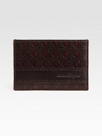 Slim design, handsomely crafted in genuine calfskin leather with embossed logo detail.Two card slotsLeather4½ x 3Made in Italy