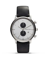 Designed for performance and style, this stainless steel watch from Emporio Armani is an exemplary choice. Features like its leather strap and glossy dial ensure commanding cool. Designed for performance and style, this stainless steel watch from Emporio Armani is an exemplary choice. Features like its leather strap and glossy dial ensure commanding cool.