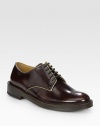 Perfectly polished with contrasting trim defines this traditional lace-up for the contemporary man of style.Leather upperLeather liningPadded insoleLeather soleMade in Italy