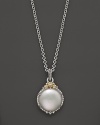 A stunning cultured pearl pendant necklace, framed in sterling silver.