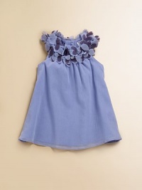 A sleeveless gem for special occasions, designed in a pretty A-line silhouette with sheer overlay and floral appliqués at the neckline.JewelneckSleevelessBack buttonsPolyesterHand washImported Please note: Number of buttons may vary depending on size ordered. A sleeveless gem for special occasions, designed in a pretty A-line silhouette with sheer overlay and floral appliqués at the neckline.JewelneckSleevelessBack buttonsPolyesterHand washImported Please note: Number of buttons may vary depending on size ordered.