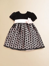 With a flower detail at the waist, gorgeous velvet and a polka-dot skirt, this pint-sized party dress is a must-have for the season.CrewneckBack button closureShort sleevesSash with flower detailTulle skirtPolyesterFully linedDry cleanMade in the USA of imported fabrics With a flower detail at the waist, gorgeous velvet and a polka-dot skirt, this pint-sized party dress is a must-have for the season.CrewneckBack button closureShort sleevesSash with flower detailTulle skirtPolyesterFully linedDry cleanMade in the USA of imported fabrics