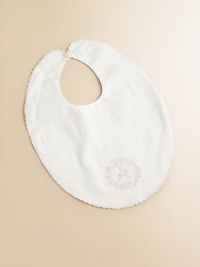 A soft cotton twill bib is finished with sweet floral embroidery and a scalloped trim.ScoopneckSingle button closureCottonMachine washImported A soft cotton twill bib is finished with sweet floral embroidery and a scalloped trim.ScoopneckSingle button closureCottonMachine washImported