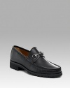 Black calfskin loafer. Silver horse bit. Lug sole Made in Italy