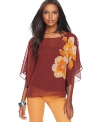 Floaty and delicate, INC's blouse gets a bold boost from a rhinestone-bedecked floral print and vivid hues. Floaty and delicate, INC's blouse gets a bold boost from a rhinestone-bedecked floral print and vivid hues.