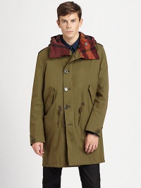 Both rugged and refined, with a warm check-lined hood and lots of protection from the elements.Attached hood with tweedy checked lining and drawstringZip close under button placketAngled flap pocketsDrawstring waistButton sleeve tabsDrawstring hemFully linedAbout 35 from shoulder to hemCotton/nylonDry cleanImported Both rugged and refined, with a warm check-lined hood and lots of protection from the elements.Attached hood with tweedy checked lining and drawstringZip close under button placketAngled flap pocketsDrawstring waistButton sleeve tabsDrawstring hemFully linedAbout 35 from shoulder to hemCotton/nylonDry cleanImported