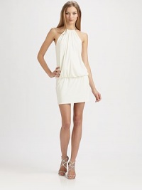 Sexy and chic, tailored with a blouson bodice and accented with a metal ring neck.Halter ring neck with clasp closureBlouson bodiceFitted skirtKeyhole backFully linedConcealed back zipAbout 16 from natural waist95% polyester/5% spandexDry cleanImportedModel shown is 5'10 (177cm) wearing US size 4. Sexy and chic, tailored with a blouson bodice and accented with a metal ring neck.Halter ring neck with clasp closureBlouson bodiceFitted skirtKeyhole backFully linedConcealed back zipAbout 16 from natural waist95% polyester/5% spandexDry cleanImportedModel shown is 5'10 (177cm) wearing US size 4.