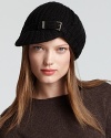 MICHAEL Michael Kors elevates the casual cap with a chunky fisherman's stitch and metal hardware.