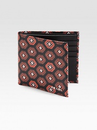 Colorful print pattern adorns this artful design crafted in textured saffiano leather.Two billfold compartmentsEight card slotsLeather4W x 4HMade in Italy