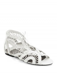 An unexpected gladiator design in netted leather with wider straps and stitch detail.Open-toe Exposed heel Leather lining and sole Padded insole Imported An unexpected gladiator design in netted leather with wider straps and stitch detail.Open-toe Exposed heel Leather lining and sole Padded insole Imported