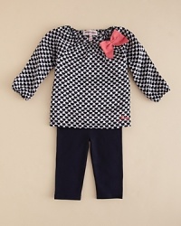 Interlocking hearts create a beguiling pattern on Juicy Couture's adorable bow-trimmed top and cropped legging set. Interlocking hearts create a beguiling pattern on Juicy Couture's adorable bow-trimmed top and cropped legging set.