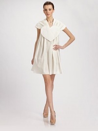 Channel quirky Parisian style with this crisp cotton blend frock, detailed with a heart on the front and a portrait collar that extends gracefully off the shoulders.Portrait collar Heart plaque at front Pleated body Side zipper with hook-and-eye Fully lined About 38 from shoulder to hem 95% cotton/5% other fibers Hand wash or dry clean Made in Italy Channel quirky Parisian style with this crisp cotton blend frock, detailed with a heart on the front and a portrait collar that extends gracefully off the shoulders.Portrait collar Heart plaque at front Pleated body Side zipper with hook-and-eye Fully lined About 38 from shoulder to hem 95% cotton/5% other fibers Hand wash or dry clean Made in Italy