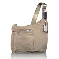 Book your ticket and travel in style with this refined crossbody bag, an essential component of the Voyageur collection. Book your ticket and travel in style with this refined crossbody bag, an essential component of the Voyageur collection.
