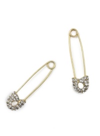 Never play it safe when it comes to sporting great style. These edgy safety pin earrings by RACHEL Rachel Roy feature sparkling crystal ends set in gold tone mixed metal. Approximate drop: 1-1/2 inches.