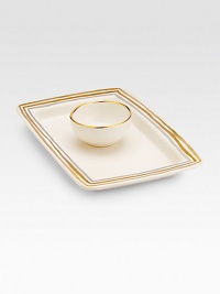 A beautiful design inspired by the pageantry of ancient horseraces features a handcrafted porcelain tray and matching bowl, both carefully glazed in concentric circles of 24k gold, platinum and rose gold. Ideal for hummus, salsa or any favorite dip Dishwasher safe 4¾W X 1½H X 4¾D Made in USA A beautiful design inspired by the pageantry of ancient horseraces features a handcrafted porcelain tray and matching bowl, both carefully glazed in concentric circles of 24k gold, platinum and rose gold. Ideal for hummus, salsa or any favorite dip Dishwasher safe 4¾W X 1½H X 4¾D Made in USA
