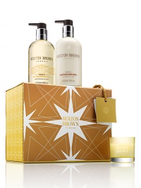 Jet off to the orange groves and delight in our bestselling festive gift for home and hands. Lively. Zesty. Irresistible. Set includes: Naran Ji Fine Liquid Hand Wash, 10 oz.; Naran Ji Soothing Hand Lotion, 10 oz. and Naran Ji Mini Candle 30g: to make your home smell unmistakably Molton Brown. Made in England. Jet off to the orange groves and delight in our bestselling festive gift for home and hands. Lively. Zesty. Irresistible. Set includes: Naran Ji Fine Liquid Hand Wash, 10 oz.; Naran Ji Soothing Hand Lotion, 10 oz. and Naran Ji Mini Candle 30g: to make your home smell unmistakably Molton Brown. Made in England.