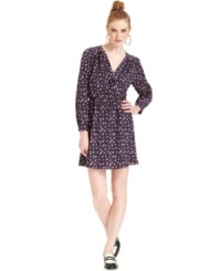Bar III's printed faux-wrap dress features a peppy print and is cinched at the waist for a flattering effect. Bar III's printed faux-wrap dress features a peppy print and is cinched at the waist for a flattering effect.