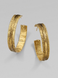 Richly textured with an organic look, these golden hoops have the sculptural appearance of wrapped and tied threads.GoldplatedDiameter, about 2Post backMade in France