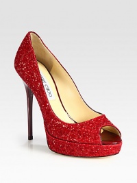 Sparkling peep toe silhouette of glitter-coated leather, upgraded with a towering heel and platform. Embossed leather heel, 5 (125mm)Embossed leather platform, 1 (25mm)Compares to a 4 heel (100mm)Glitter-coated leather upperPeep toeLeather lining and solePadded insoleMade in ItalyOUR FIT MODEL RECOMMENDS ordering one size up as this style runs small. Sparkling peep toe silhouette of glitter-coated leather, upgraded with a towering heel and platform. Embossed leather heel, 5 (125mm)Embossed leather platform, 1 (25mm)Compares to a 4 heel (100mm)Glitter-coated leather upperPeep toeLeather lining and solePadded insoleMade in ItalyOUR FIT MODEL RECOMMENDS ordering one size up as this style runs small.