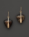 Faceted, trillion-cut smoky quartz, set in hammered 14K yellow gold.