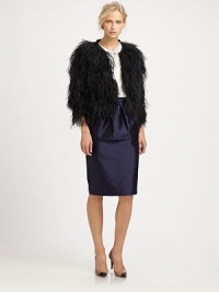 A vision of opulence with allover tiered ostrich feathers and a modern cropped silhouette.Stand collar with front hook-and-eye closureThree-quarter sleevesAbout 21 from shoulder to hemFully linedViscose with ostrich feathersDry cleanImportedModel shown is 5'11 (180cm) wearing US size 4. A vision of opulence with allover tiered ostrich feathers and a modern cropped silhouette.Stand collar with front hook-and-eye closureThree-quarter sleevesAbout 21 from shoulder to hemFully linedViscose with ostrich feathersDry cleanImportedModel shown is 5'11 (180cm) wearing US size 4.