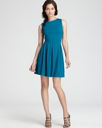 Aqua's box pleat dress boasts versatile style and a flattering silhouette. Pair with heel and add bold accessories for statement chic. Aqua's box pleat dress boasts versatile style and a flattering silhouette. Pair with heel and add bold accessories for statement chic.