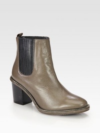 Classic leather staple with sleek zip-trim and side elastic panels for easy on and off access. Stacked heel, 2½ (65mm)Leather upper with stretch elastic panels and zipper trimPull-on styleLeather lining and solePadded insoleImported Classic leather staple with sleek zip-trim and side elastic panels for easy on and off access. Stacked heel, 2½ (65mm)Leather upper with stretch elastic panels and zipper trimPull-on styleLeather lining and solePadded insoleImported