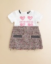 A sweet heart print tee on top and a chic, chunky tweed below create a charming combination for your young style maven.Round necklineShort sleevesFront screenBack buttonsTweed skirt frayed at waist and hemFaux pocket openings54% cotton/38% viscose/6% polyamide/2% acetateDry cleanImported