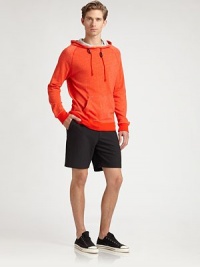 Vibrant sweatshirt with jersey lined hood and banded cuffs and hem, finished in a remarkably soft cotton knit for a long lasting impression of substance and style.Attached drawstring hoodWaist kangaroo pocketsBanded cuffs and hemCottonMachine washImported Vibrant sweatshirt with jersey lined hood and banded cuffs and hem, finished in a remarkably soft cotton knit for a long lasting impression of substance and style.Attached drawstring hoodWaist kangaroo pocketsBanded cuffs and hemCottonMachine washImported