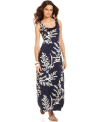 A beautiful vine print winds around this stunning Sunny Leigh maxi dress, adding a soft, romantic feel to its classic silhouette. Flat sandals make it a go-anywhere affair, while dramatic heels dress it up for date night. A beautiful vine print winds around this stunning Sunny Leigh maxi dress, adding a soft, romantic feel to its classic silhouette. Flat sandals make it a go-anywhere affair, while dramatic heels dress it up for date night.