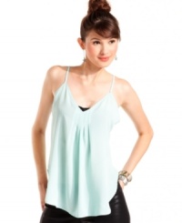 An important piece for any healthy wardrobe, this spaghetti strap top from Ali & Kris looks great with everything from denim skirts to leather pants. An important piece for any healthy wardrobe, this spaghetti strap top from Ali & Kris looks great with everything from denim skirts to leather pants.