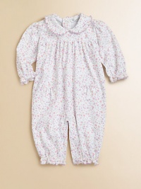 Crafted in ultra-soft, plush pima cotton with charming ruffle trim and a fall flourish print, this precious one-piece is a must-have for baby.Ruffled crewneckLong sleeves with ruffled cuffsGathered yokeBack snapsPatch pocketsBottom snapsPima cottonMachine washImported Please note: Number of snaps may vary depending on size ordered. Crafted in ultra-soft, plush pima cotton with charming ruffle trim and a fall flourish print, this precious one-piece is a must-have for baby.Ruffled crewneckLong sleeves with ruffled cuffsGathered yokeBack snapsPatch pocketsBottom snapsPima cottonMachine washImported Please note: Number of snaps may vary depending on size ordered.
