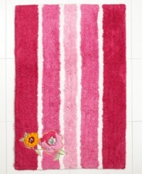 Blossoms in bloom. Bold stripes with a floral embellishment in a fusion of dazzling colors creates a modern flair in this Floral Fusion bath rug. Blossoms in bloom. Bold stripes with a floral embellishment in a fusion of dazzling colors creates a modern flair in this Floral Fusion bath rug.