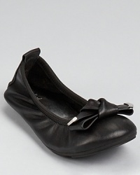 For parties, play or even serious stuff, this classic flat adorned with a leather bow and silvertone trim ties her everyday look together. For parties, play or even serious stuff, this classic flat adorned with a leather bow and silvertone trim ties her everyday look together.