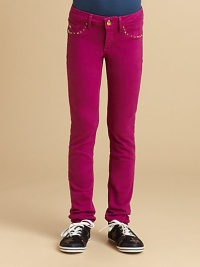 Super skinny, almost like leggings, these clingy jeans have street-smart golden studs edging the pockets for a touch of bling.Waistband with button close and belt loopsZip flyFront scoop pockets with studs and coing pocket with charmBack patch pockets with studsSkinny fit86% cotton/11% polyester/3% spandexMachine washMade in USA Super skinny, almost like leggings, these clingy jeans have street-smart golden studs edging the pockets for a touch of bling.Waistband with button close and belt loopsZip flyFront scoop pockets with studs and coing pocket with charmBack patch pockets with studsSkinny fit86% cotton/11% polyester/3% spandexMachine washMade in USA