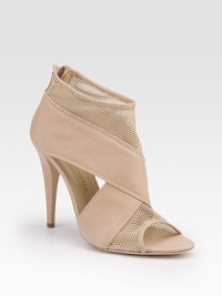 Wide, crisscross leather straps and airy mesh inserts create an intriguing design with cutout sides and a high heel.Self-covered heel 4 (100mm) Peep-toe Back zipper Leather lining and sole Padded insole Made in Italy Wide, crisscross leather straps and airy mesh inserts create an intriguing design with cutout sides and a high heel.Self-covered heel 4 (100mm) Peep-toe Back zipper Leather lining and sole Padded insole Made in Italy