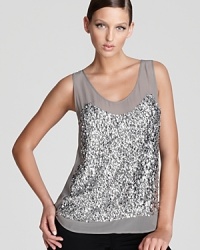 Make a statement in metallics with this sequin-embellished Madison Marcus silk top. Pair with a tuxedo-inspired suit for soiree chic. Make a statement in metallics with this sequin-embellished Madison Marcus silk top. Pair with a tuxedo-inspired suit for soiree chic.