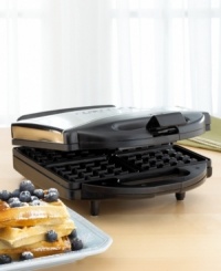 The Krups Waffle Chef 4-Slice Belgian Waffler lets you make four thick, fluffy waffles at once, in a powerful 1300-watt unit. Its sleek chrome design includes features like a non-stick interior, indicator lights for power and temperature control, and a storage latch. Includes manufacturer's limited warranty. Model #65475. The Krups Waffle Chef 4-Slice Belgian Waffler lets you make four thick, fluffy waffles at once, in a powerful 1300-watt unit. Its sleek chrome design includes features like a non-stick interior, indicator lights for power and temperature control, and a storage latch. Includes manufacturer's limited warranty. Model #65475.