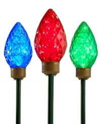 Light the way. Glowing in blue, red and green, Kurt Adler's bulb lawn stakes brighten your yard for the holiday. Light the way. Glowing in blue, red and green, Kurt Adler's bulb lawn stakes brighten your yard for the holiday.