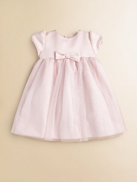 A dazzling design featuring short puff sleeves, a center bow and full, glittery skirt for precious moments.JewelneckShort puff sleevesBack buttonsGathered waist with bowFull skirtPolyester tulleDry cleanImported Please note: Number of buttons may vary depending on size ordered. A dazzling design featuring short puff sleeves, a center bow and full, glittery skirt for precious moments.JewelneckShort puff sleevesBack buttonsGathered waist with bowFull skirtPolyester tulleDry cleanImported Please note: Number of buttons may vary depending on size ordered.