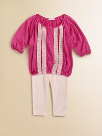 Pretty lace trim, a gathered silhouette and matching leggings make this sweet set a must-have for baby. Tunic ScoopneckThree-quarter sleevesElastic hem Leggings Elastic waistbandTop: rayonLeggings: 95% cotton/5% spandexMachine washImported Pretty lace trim, a gathered silhouette and matching leggings make this sweet set a must-have for baby. Tunic ScoopneckThree-quarter sleevesElastic hem Leggings Elastic waistbandTop: rayonLeggings: 95% cotton/5% spandexMachine washImported
