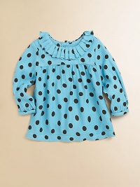 Bursting with polka dots and pleats, this cozy woven top has back buttons and long sleeves.Round neckline with pleatsLong sleevesBack buttonsCottonMachine washImported Please note: Number of buttons may vary depending on size ordered. Bursting with polka dots and pleats, this cozy woven top has back buttons and long sleeves.Round neckline with pleatsLong sleevesBack buttonsCottonMachine washImported Please note: Number of buttons may vary depending on size ordered.