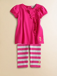Simply adorable and totally girly, a vibrant knit top with a side ruffle, bow and back snaps is paired with a pair of striped leggings. Tunic CrewneckShort puff sleevesBack snaps Leggings Elastic waistband94% cotton/6% spandexMachine washImported Simply adorable and totally girly, a vibrant knit top with a side ruffle, bow and back snaps is paired with a pair of striped leggings. Tunic CrewneckShort puff sleevesBack snaps Leggings Elastic waistband94% cotton/6% spandexMachine washImported