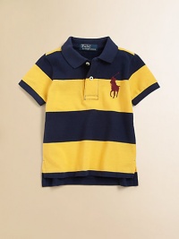 A colorful striped design accents this classic polo shirt in lightweight, knit cotton.Pointed polo collarShort sleevesButton-frontUneven vented hemCottonMachine washImported Please note: Number of buttons may vary depending on size ordered. A colorful striped design accents this classic polo shirt in lightweight, knit cotton.Pointed polo collarShort sleevesButton-frontUneven vented hemCottonMachine washImported Please note: Number of buttons may vary depending on size ordered.