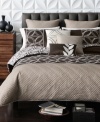 Unwind in sophisticated style with this Venice comforter set from Bryan Keith, showcasing modern lines and shapes in a bold yet neutral palette. Comforter features both printed and embroidered details with a printed geometric pattern reverse for a whole new look.