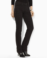 Exquisite embroidery and light-catching sequins enliven a sleek pair of jeans crafted from soft cotton with a hint of stretch. Exquisite embroidery and light-catching sequins enliven a sleek pair of jeans crafted from soft cotton with a hint of stretch.